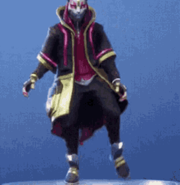a statue of a man with a mask on his face is standing on a blue surface .