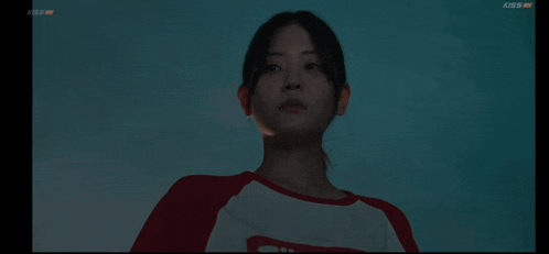 a close up of a woman 's face with the words kbs on the bottom right