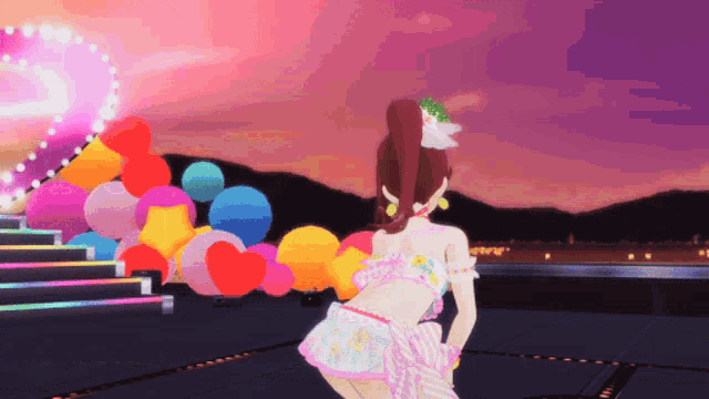 a girl in a pink top is standing in front of a bunch of balloons