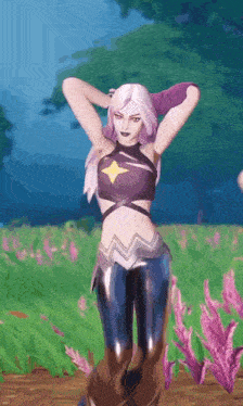 a woman in a purple top and black pants is standing in a field with her hands on her head .