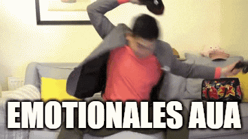 a man in a suit is sitting on a couch with the words emotionales aua on the bottom