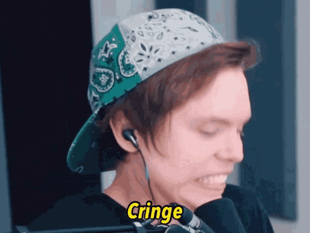 a man wearing headphones and a hat says cringe in yellow letters