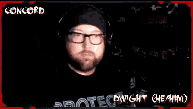 a man wearing glasses and headphones with the name concord on the top