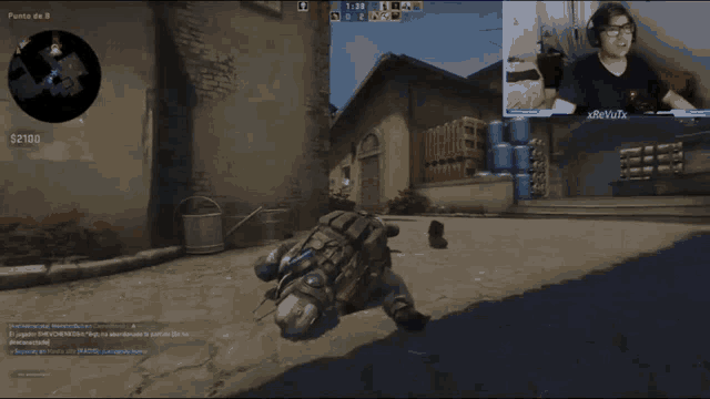 a man playing a video game with a price tag of 2100