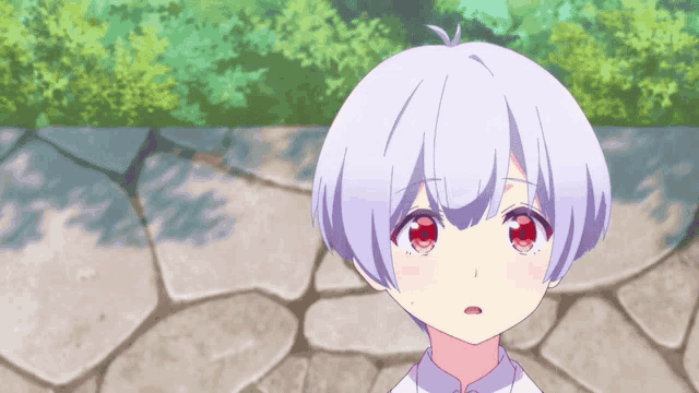 a girl with white hair and red eyes is standing on a stone walkway