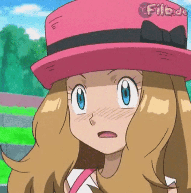 a close up of a cartoon girl wearing a pink hat with the word filade written on it