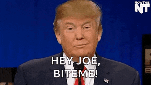 donald trump is smiling and saying `` hey joe , bite me '' .
