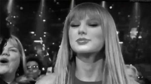 Taylor Swift Shrug GIF - Taylor Swift Shrug GIFs