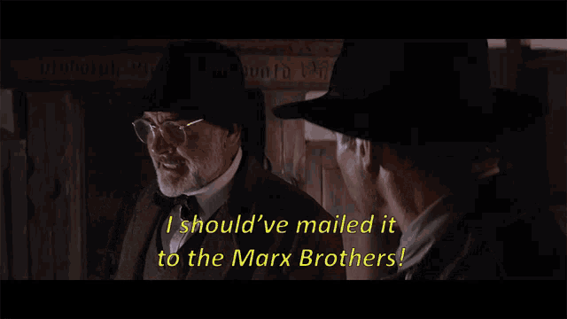 a man in a hat is talking to another man with the words i should 've mailed it to the marx brothers