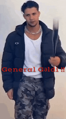 a man in a black jacket and camo pants is holding a knife with the words general geldi written on the bottom