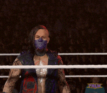 a man wearing a purple mask stands in a wrestling ring with a fnlw logo in the corner