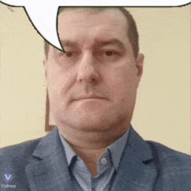 a man in a suit has a speech bubble above his head from vidnoz