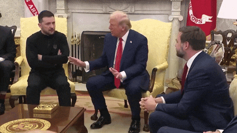 a group of men are sitting around a table with a plaque on it that says ' army ' on it