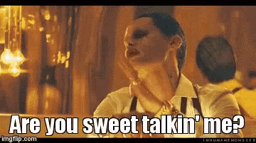 a man is talking to another man and the words are you sweet talkin ' me
