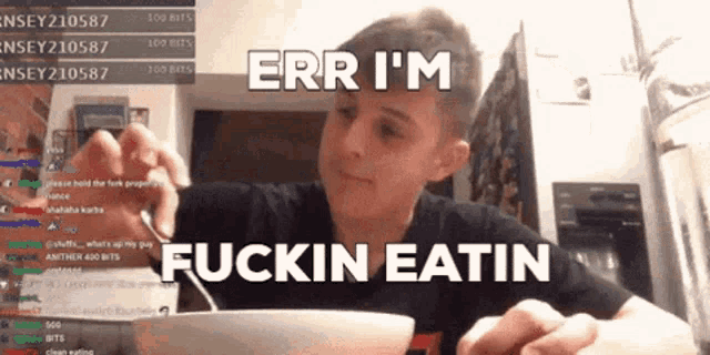 a young man eating a bowl of food with the words " err i 'm fuckin eatin " written on the bottom