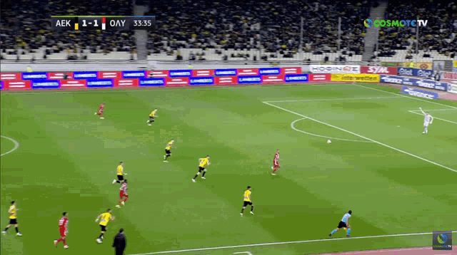 a soccer game is being played and the score is 1 to 1