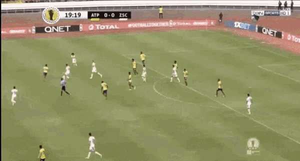 a soccer game is being played in a stadium and the score is 0-0