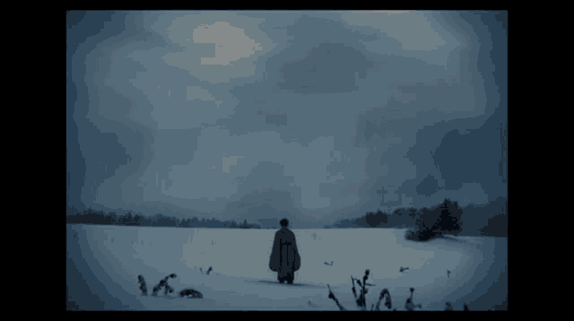 a person standing in a snowy field with a giant hand in the background
