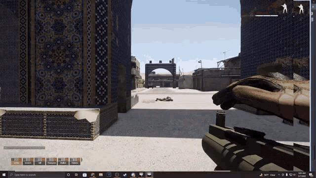 a person holding a gun in front of a screen that says ' type here to search ' on it
