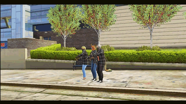 three people are standing on a sidewalk in front of a building with a red sign that says emergency exit