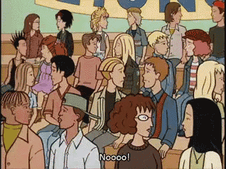 a group of people are sitting in a stadium and one of them is saying nooooo