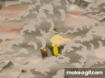 a cartoon character is laying on the ground surrounded by smoke and dust .