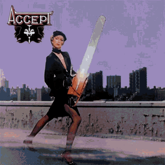 a woman holding a chainsaw is on the cover of accept 's album