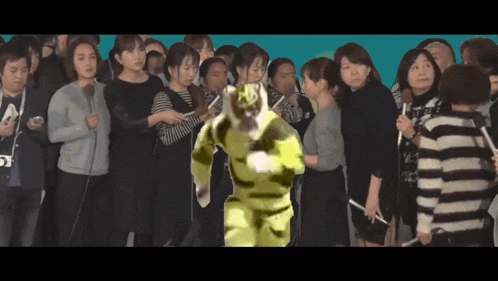 a group of people are standing around a tiger