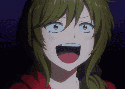 a close up of a girl with green hair and red eyes