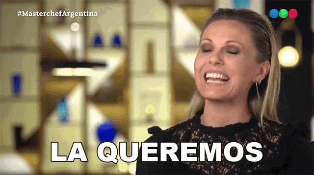 a woman in a black lace top is laughing and says la queremos