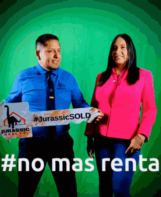 a man and woman holding a sign that says #jurassicsold