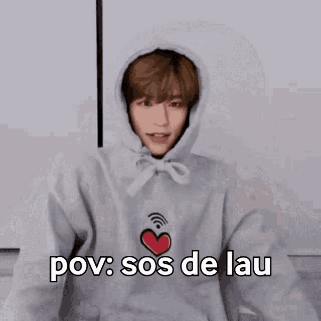 a person wearing a hoodie with the words pov sos de lau