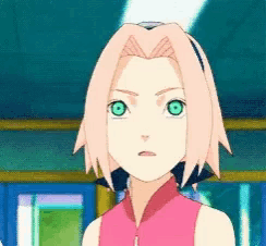 a girl with pink hair and green eyes is looking at the camera