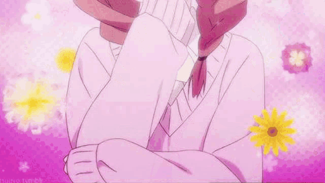 a girl with pink hair and a braid is covering her mouth with her hand .