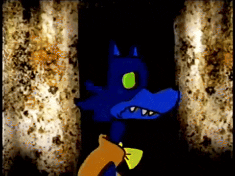 a blue cartoon character with a yellow eye is standing in front of a rusty wall