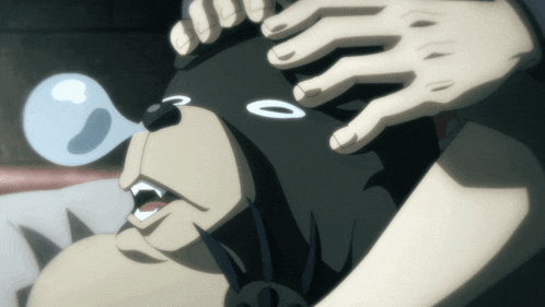 a person is putting a mask on another person 's head with the number 0 on it