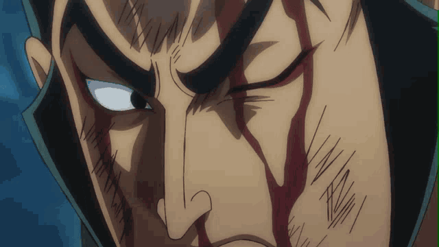 a close up of a cartoon character 's face with blood coming out of it