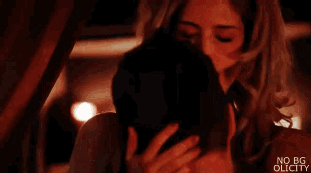 a man and a woman are having sex in a hot tub with candles .