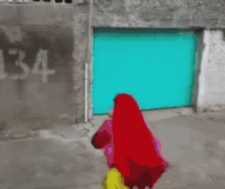 a pixelated image of mcdonald 's elmo jumping in the air