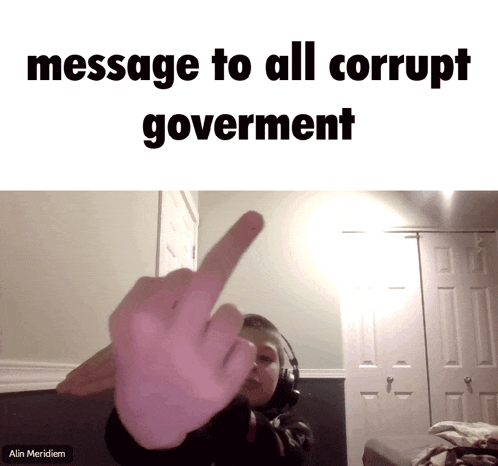 a person giving the middle finger with the words message to all corrupt government below