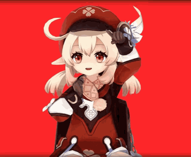 a girl in a red hat with a clover on it is standing in front of a red background
