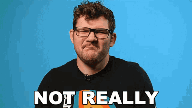 a man wearing glasses and a black shirt that says not really on it
