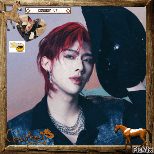 a framed picture of a man with red hair and the words cowboy up on it