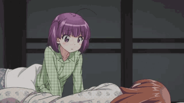 a girl with purple hair and pink eyes is standing next to another girl