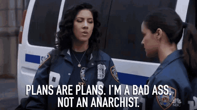 two police officers are standing next to each other and one of them is saying plans are plans