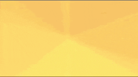 a close up of a light shining through a window