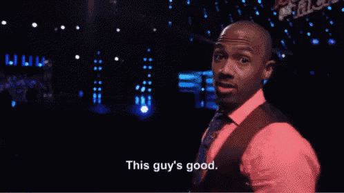 a man is giving a thumbs up and says this guy 's good