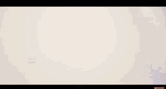 a person standing in front of a white door with a youtube subscribe button on the bottom right
