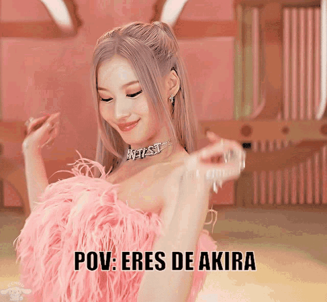 a woman in a pink feathered dress with the words pov eres de akira on the bottom