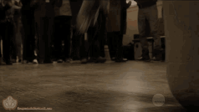 a dog 's paws are shown in a scene from a space tv show